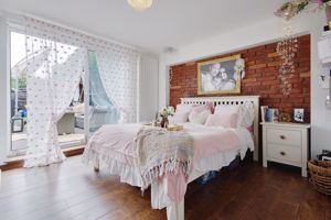 Bedroom One- click for photo gallery